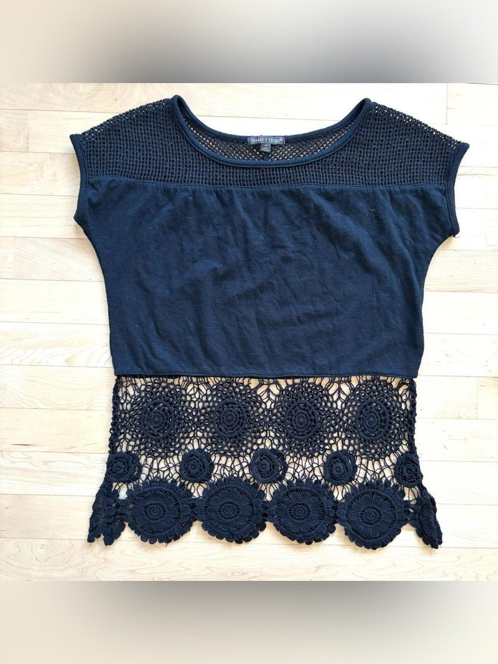 Threads 4 Thought black t shirt with crochet cut out top and bottom panel